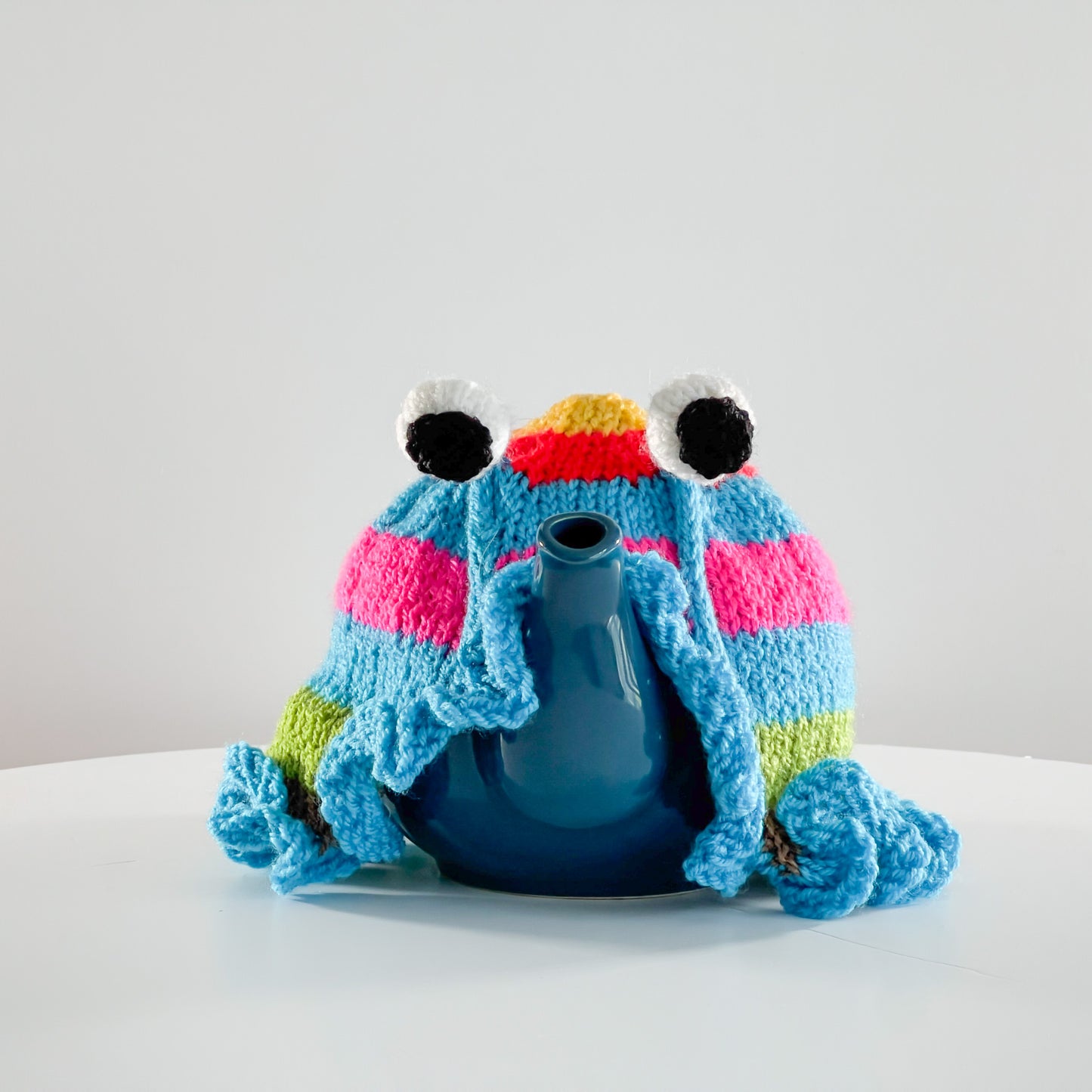 Ruperts house stripy snail tea cosy