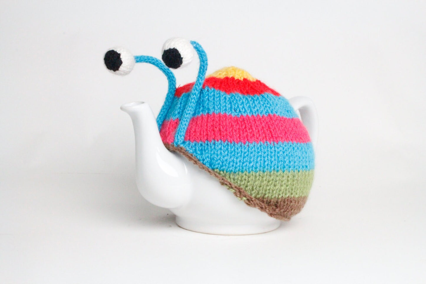 Knitted blue stripy snail tea cosy. Tea lovers teatime treat.