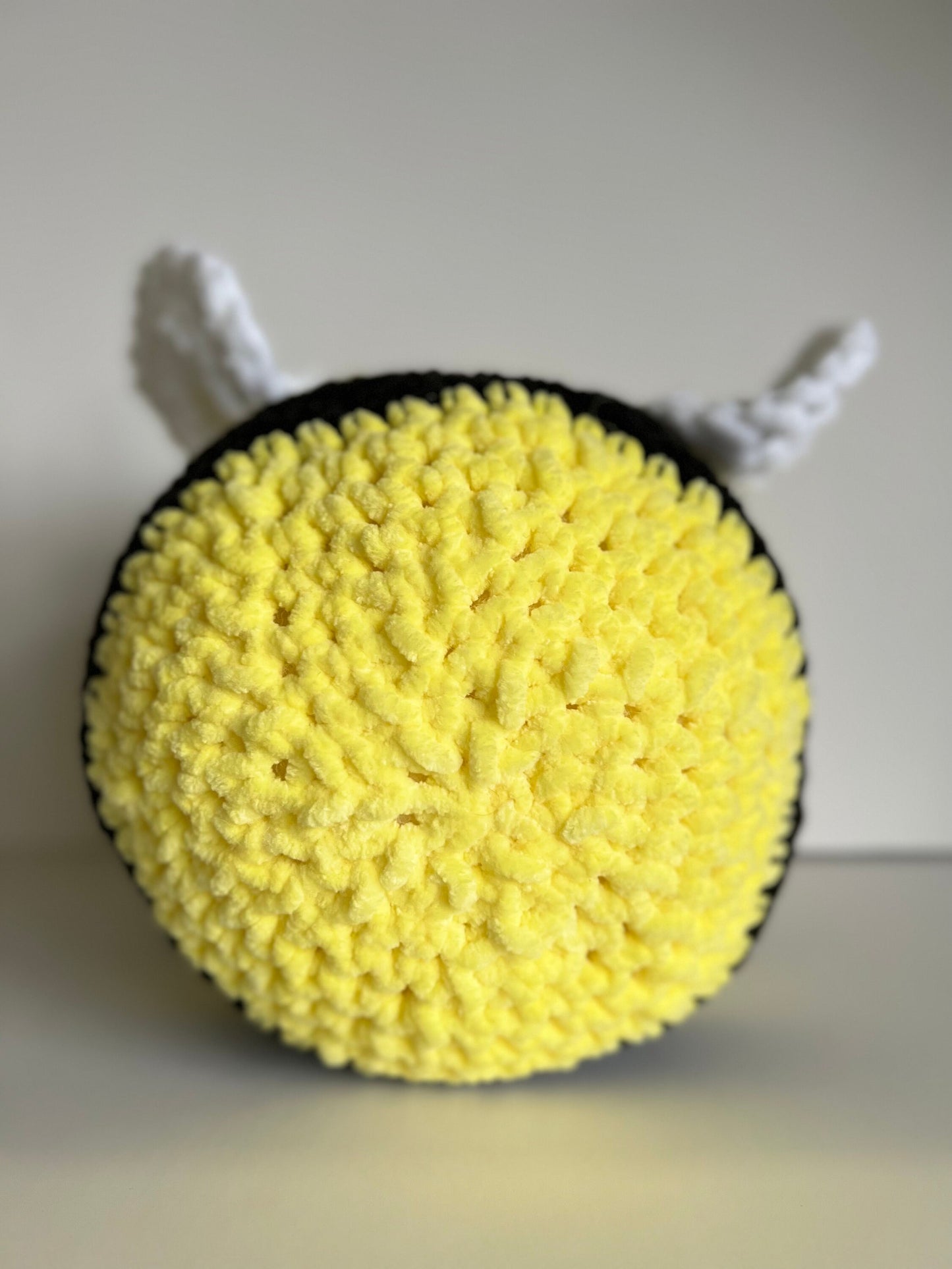 Jumbo the bumble bee - hand crochet super sized chenille cuddle buddy. Available with happy or sad face. Super squishy comforter.