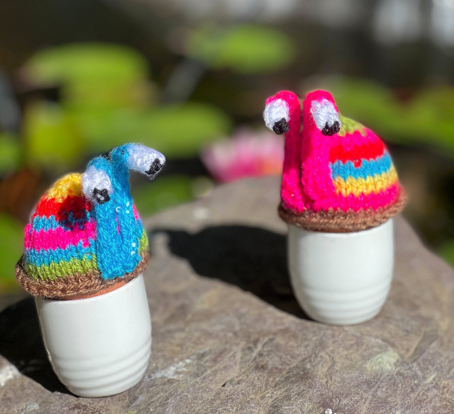 Knitted blue stripy snail tea cosy. Tea lovers teatime treat.