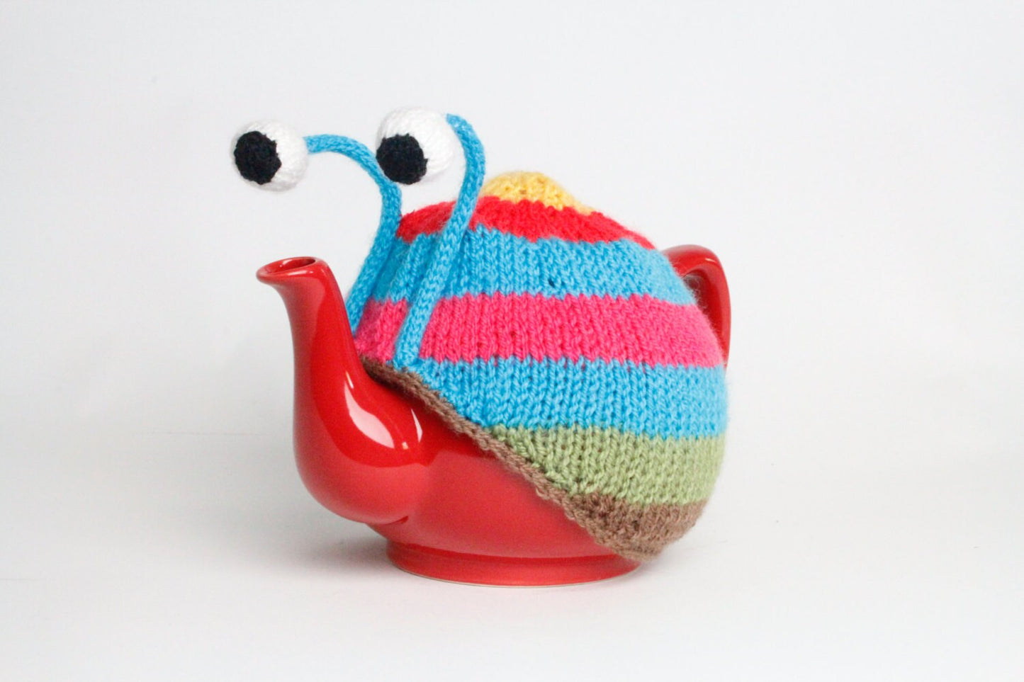 Knitted blue stripy snail tea cosy. Tea lovers teatime treat.