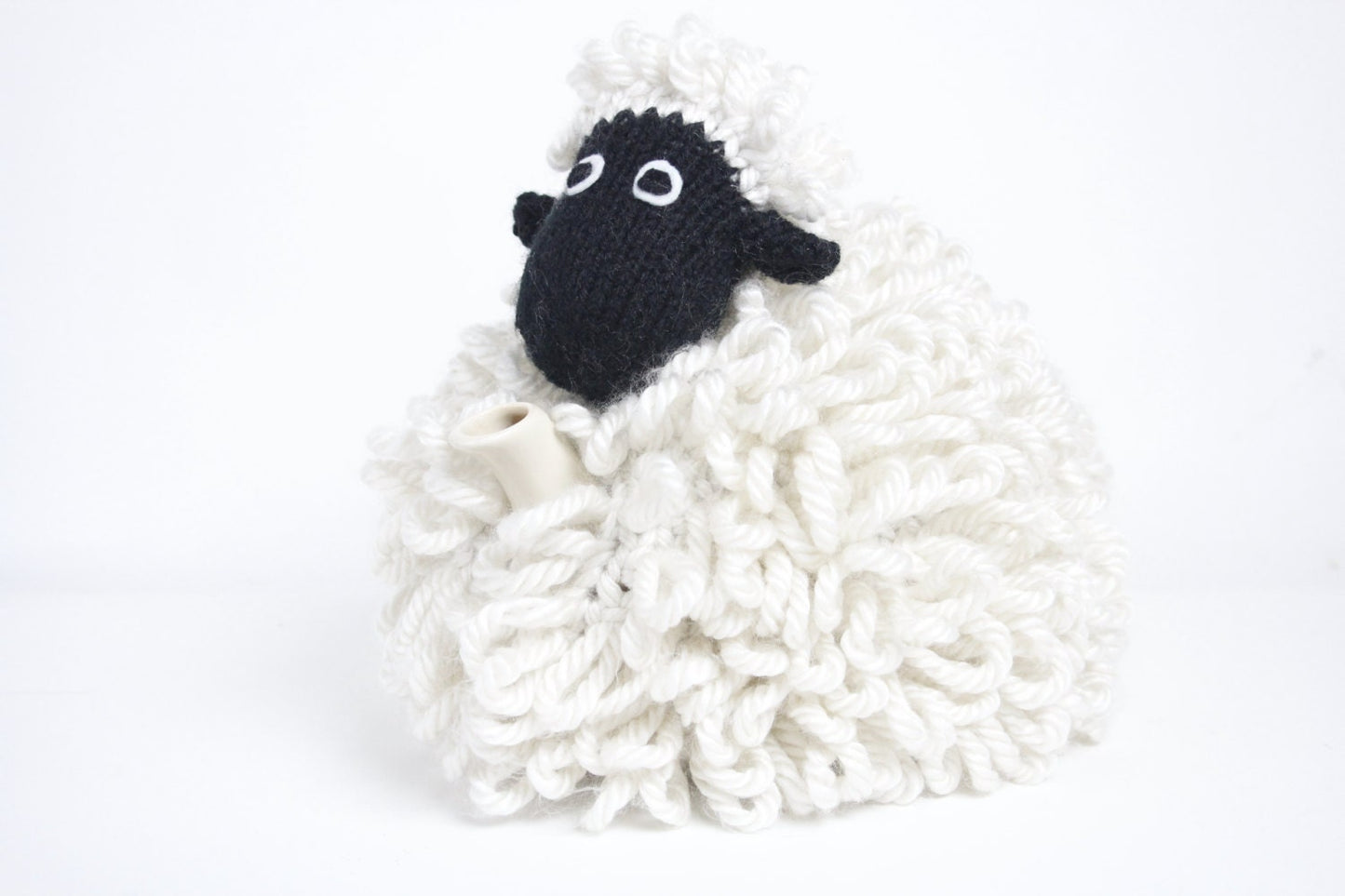 Mabel the sheep tea cosy hand knitted in chunky cream yarn