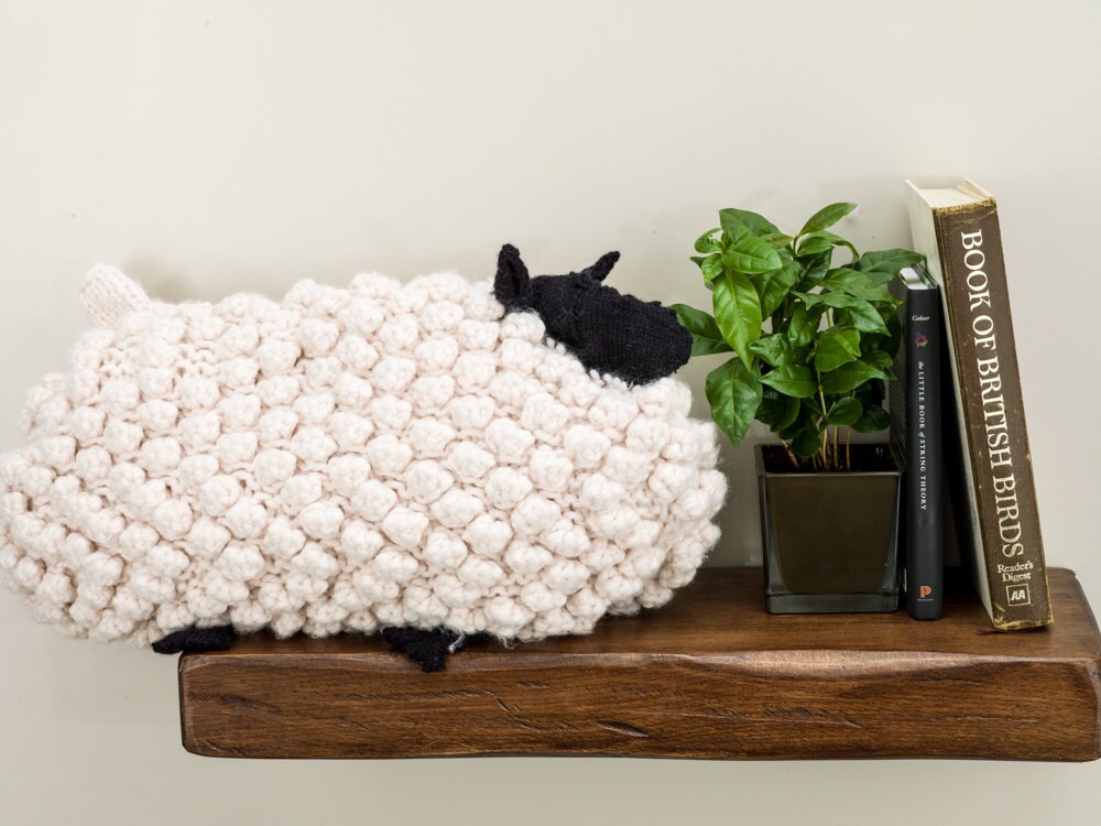 Sheep reversible pillow hand crochet in super chunky cream wool yarn.