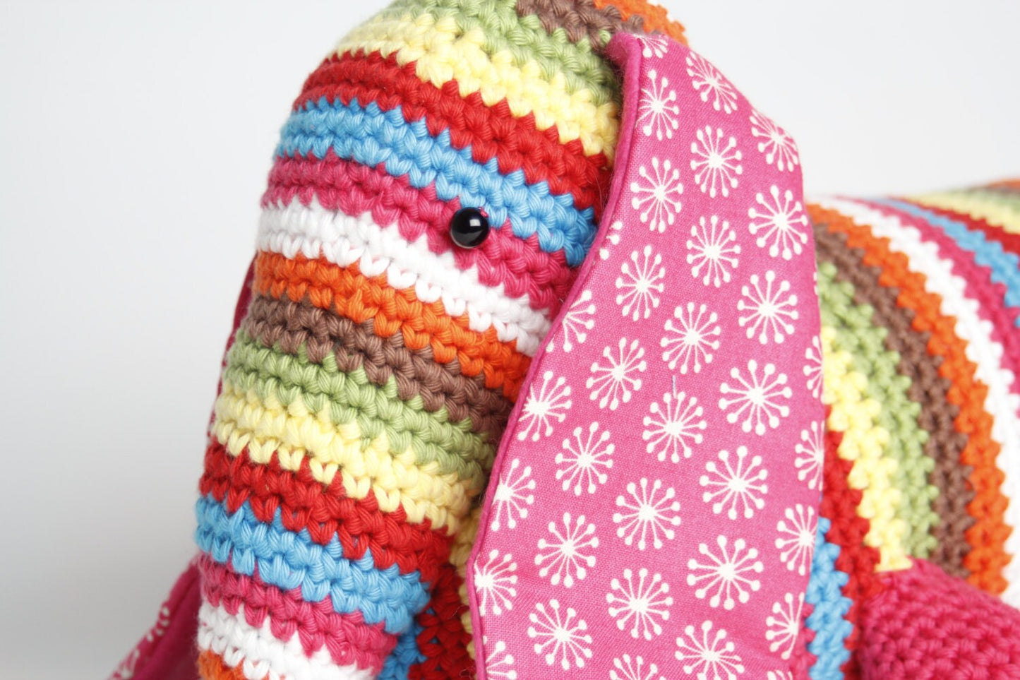 Stripy dachshund sausage dog crochet doorstop or draught excluder.