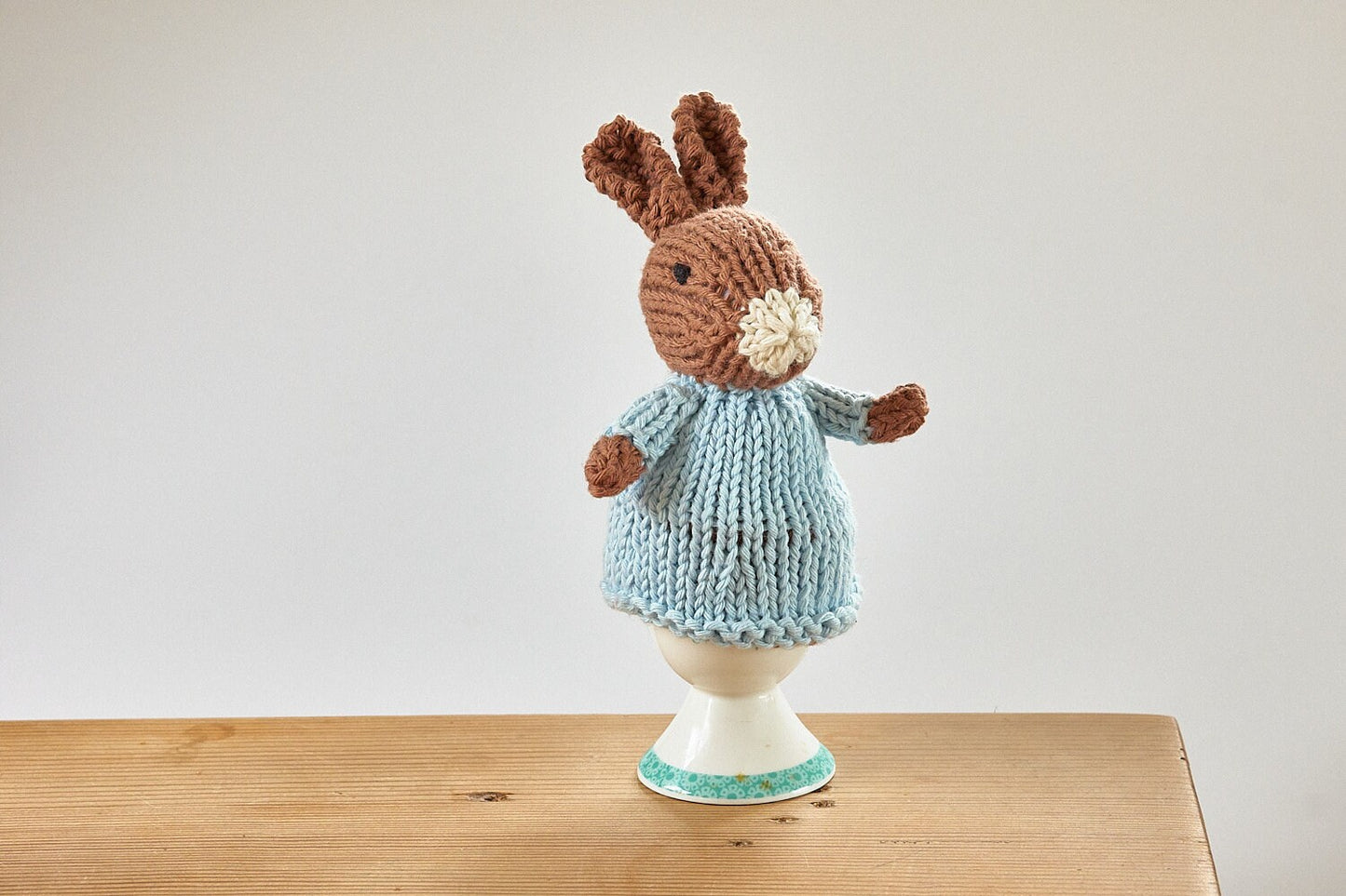 Egg cosy Rabbits by Rupert's House - hand knitted in washable cotton yarn.