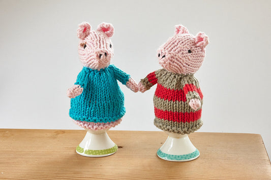 Egg cosy pigs by Rupert's House - hand knitted in washable cotton yarn.