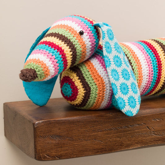 Stripy dachshund sausage dog crochet doorstop or draught excluder.