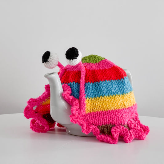 All frills and no spills with our Stripy Frilly Snail Tea Cosy