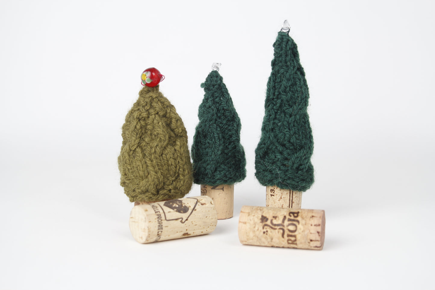 Knitted christmas tree bottle stoppers