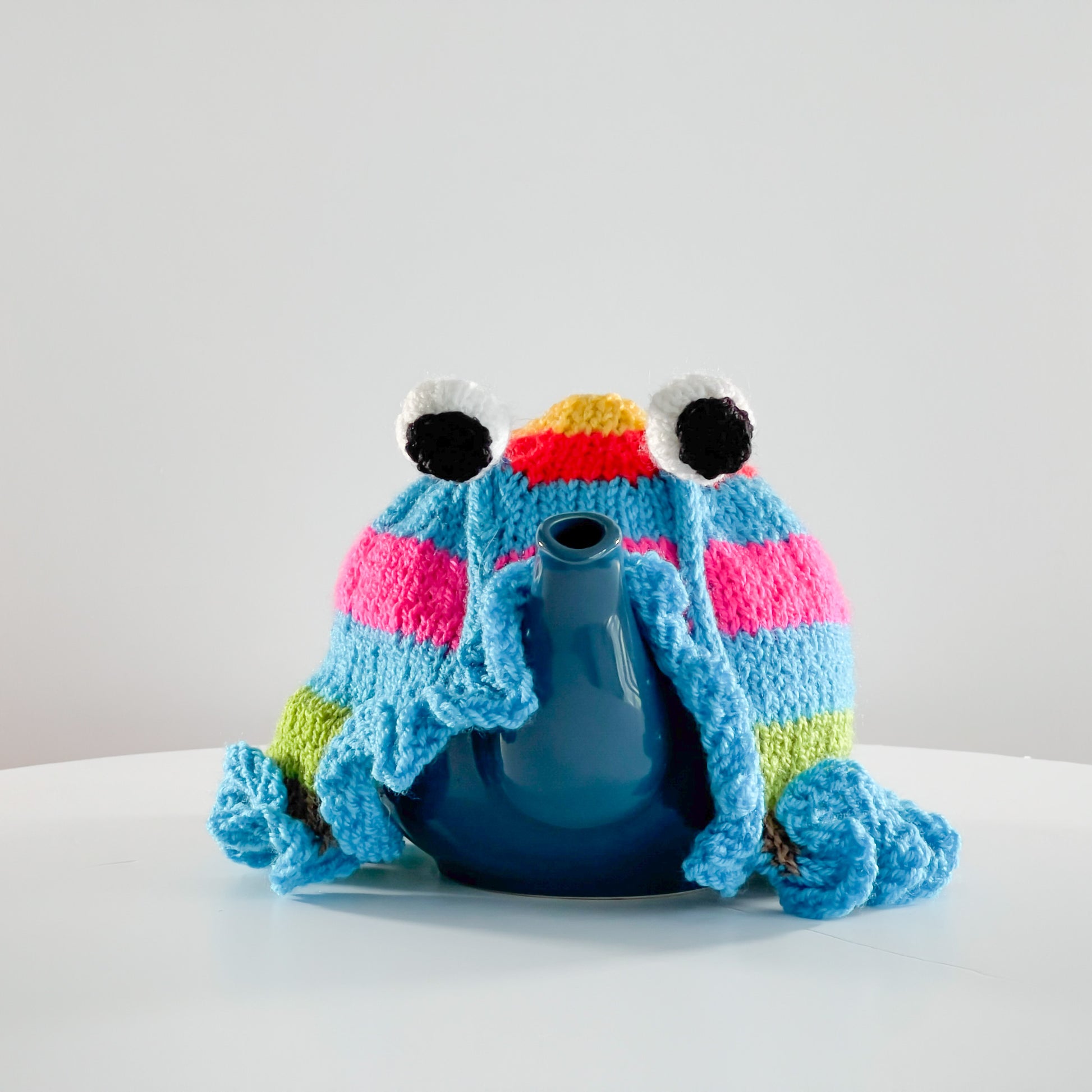Ruperts house stripy snail tea cosy