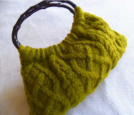 Cable knit hand bag knitting pattern