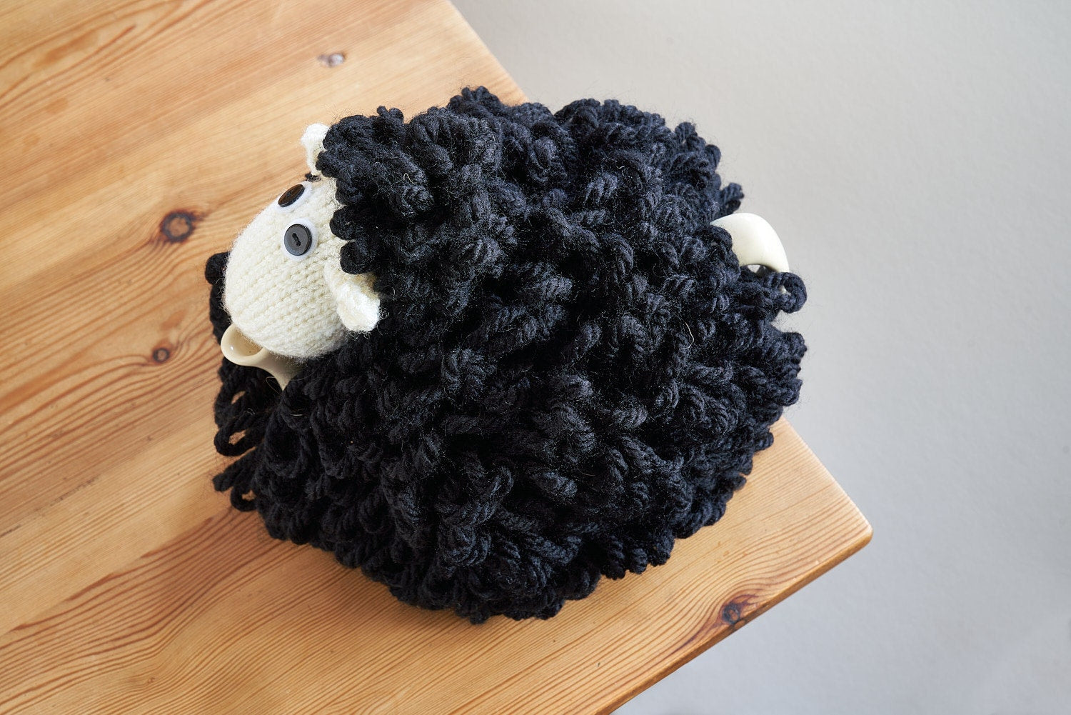 Mabel the sheep tea cosy hand knitted in chunky cream yarn