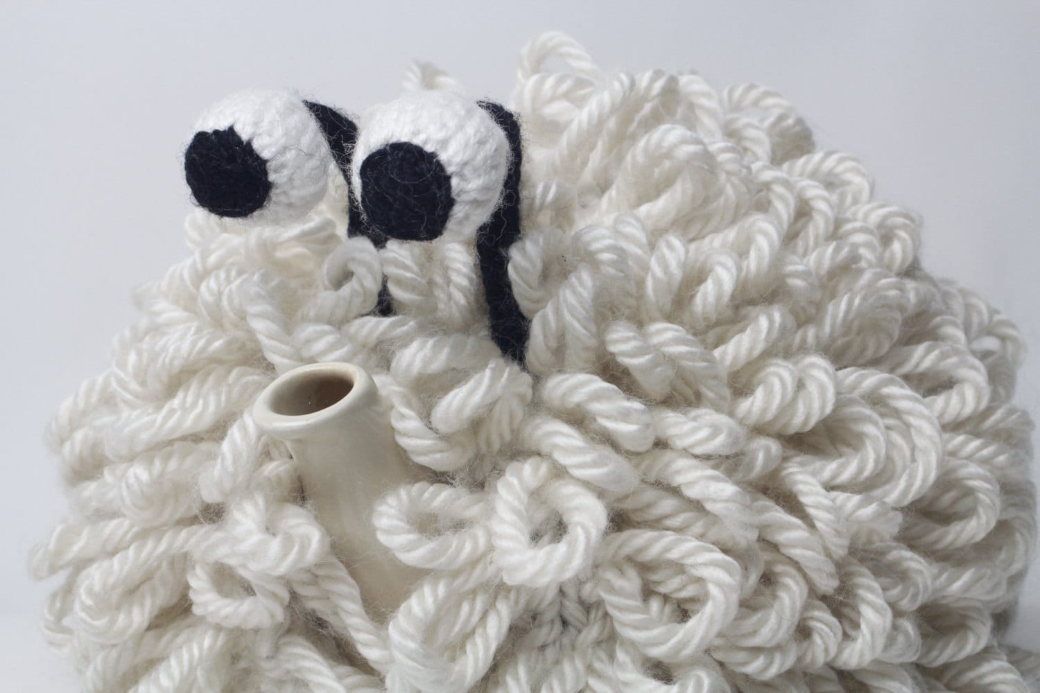Dolly the Sheep hand knitted woolly tea cosy.