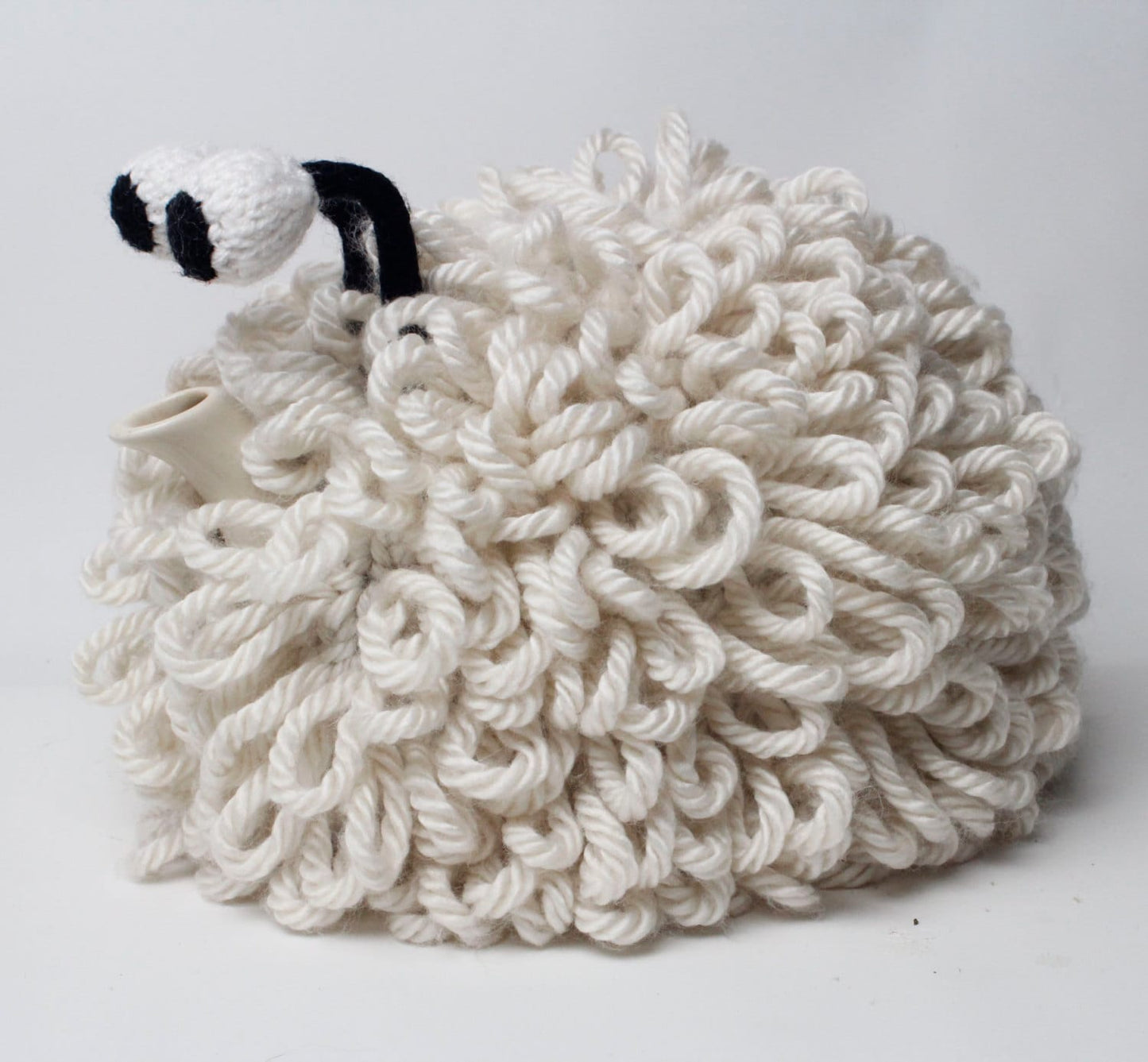 Dolly the Sheep hand knitted woolly tea cosy.