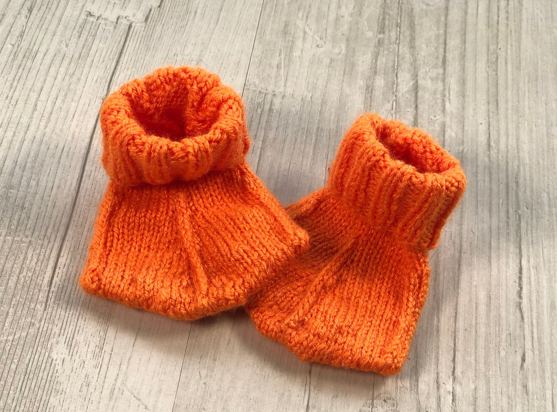 Duck flamingo dinosaur baby boots. Hand knitted washable and can be made in any colour.