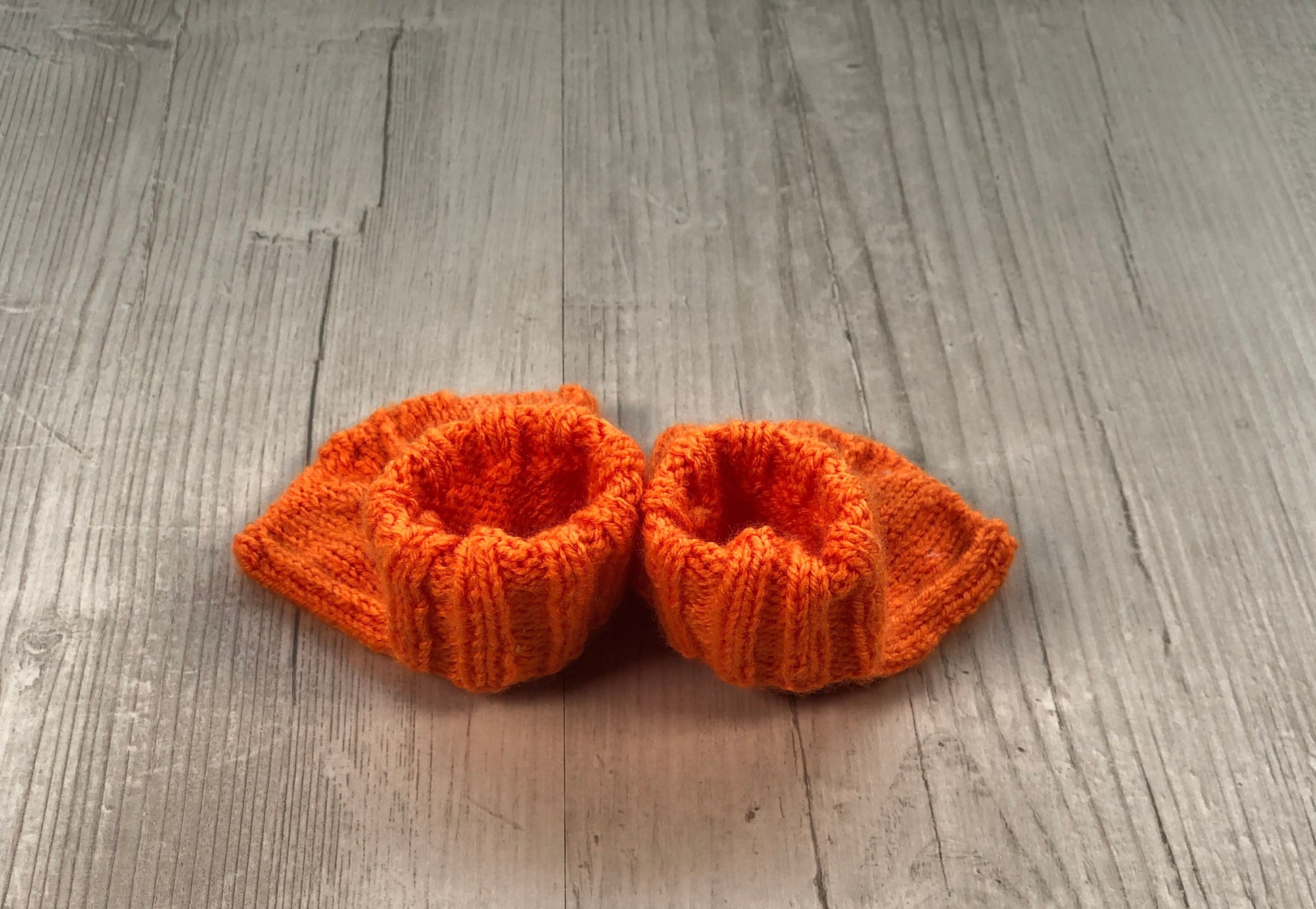 Duck flamingo dinosaur baby boots. Hand knitted washable and can be made in any colour.