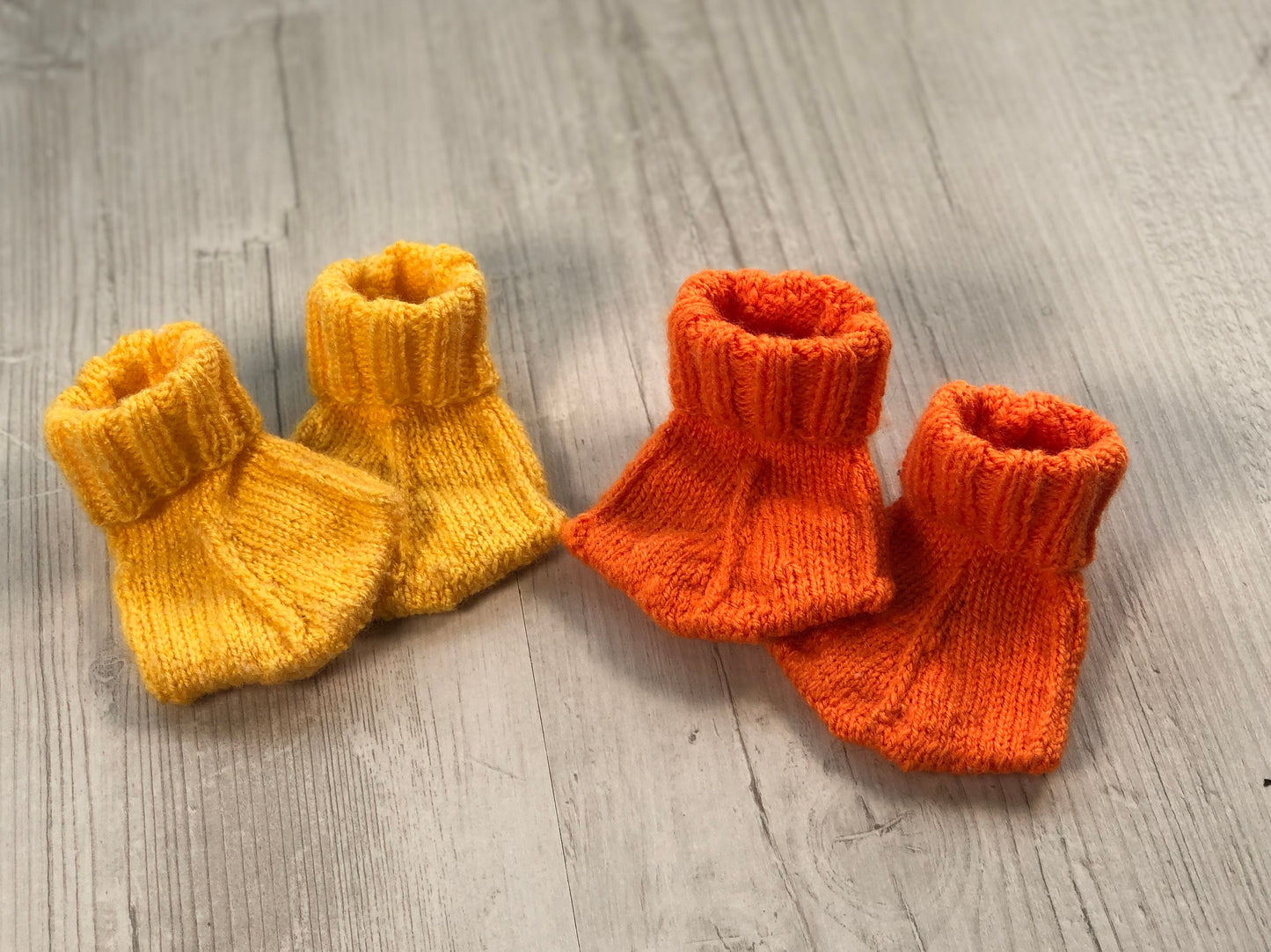 Duck flamingo dinosaur baby boots. Hand knitted washable and can be made in any colour.