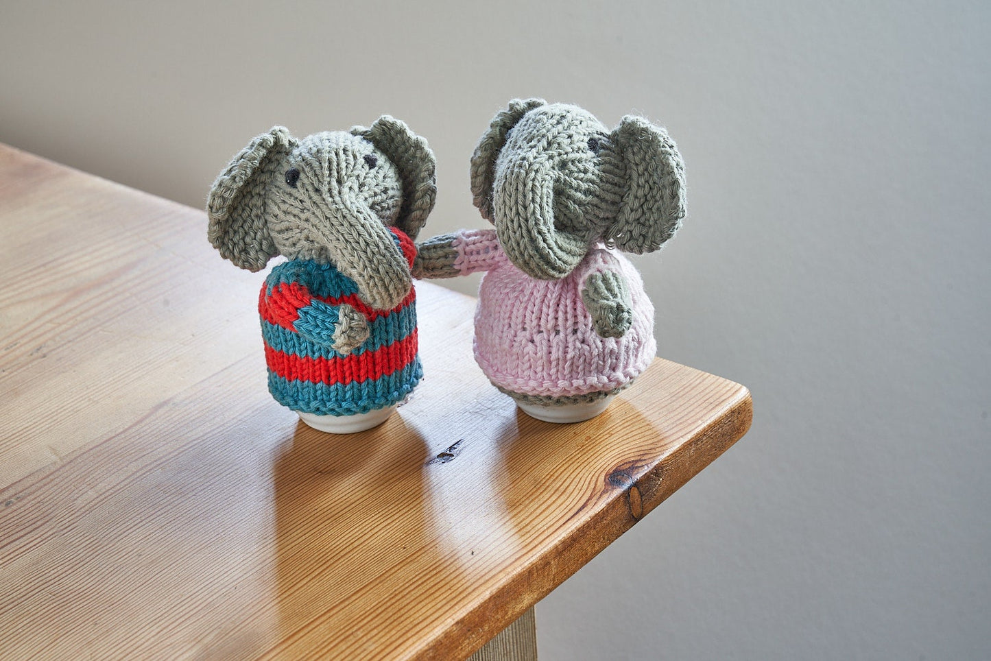 Egg cosy elephants by Rupert's House - hand knitted in washable cotton yarn.