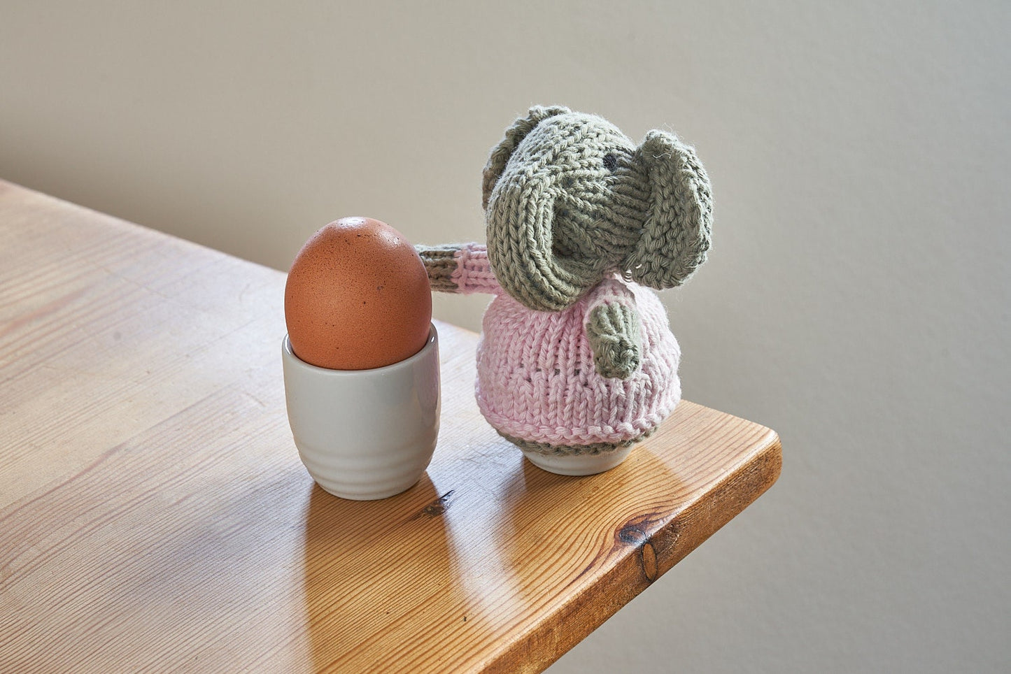 Egg cosy elephants by Rupert's House - hand knitted in washable cotton yarn.