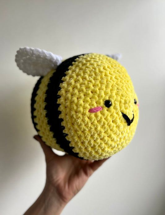 Jumbo the bumble bee - hand crochet super sized chenille cuddle buddy. Available with happy or sad face. Super squishy comforter.