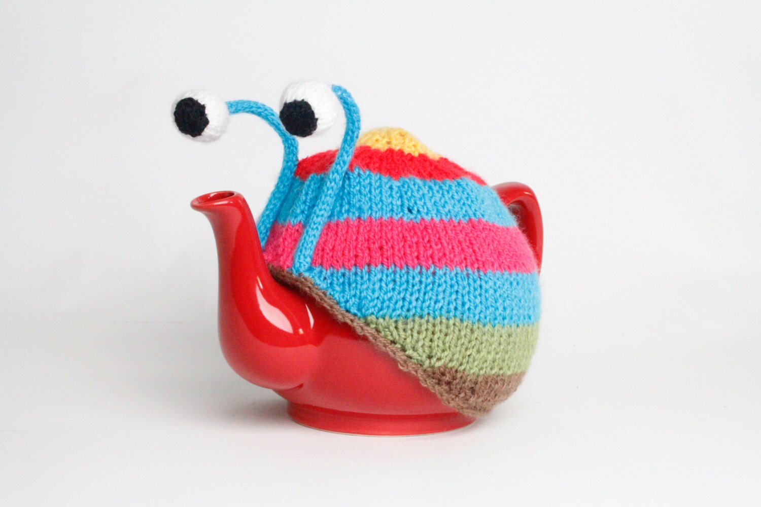 Knitted blue stripy snail tea cosy. Tea lovers teatime treat.