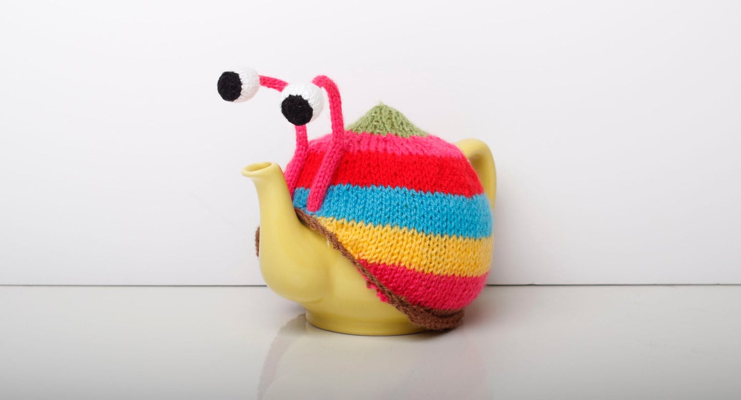 Knitted pink stripy snail tea cosy. Tea lovers teatime treat.