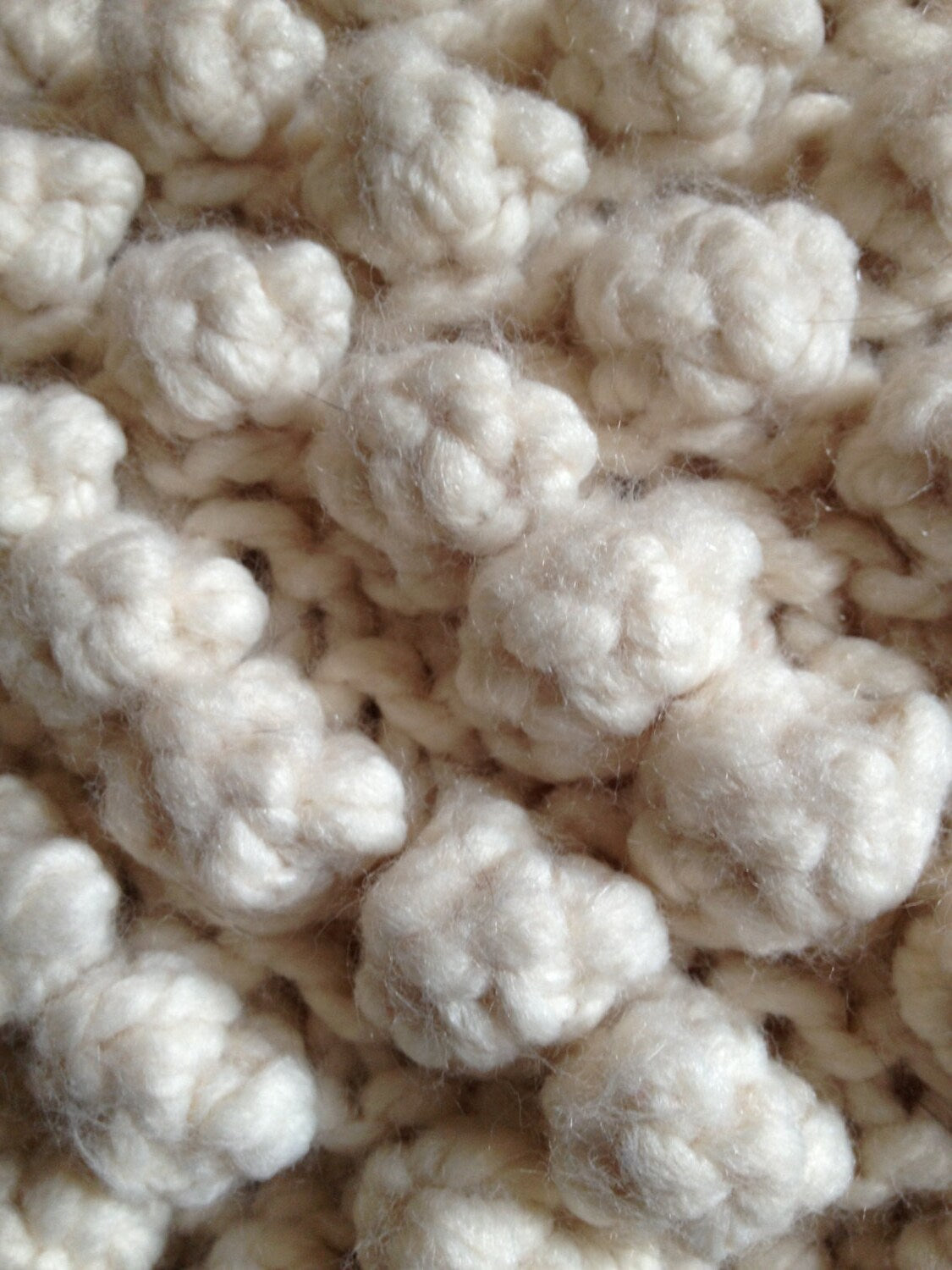 Sheep reversible pillow hand crochet in super chunky cream wool yarn.