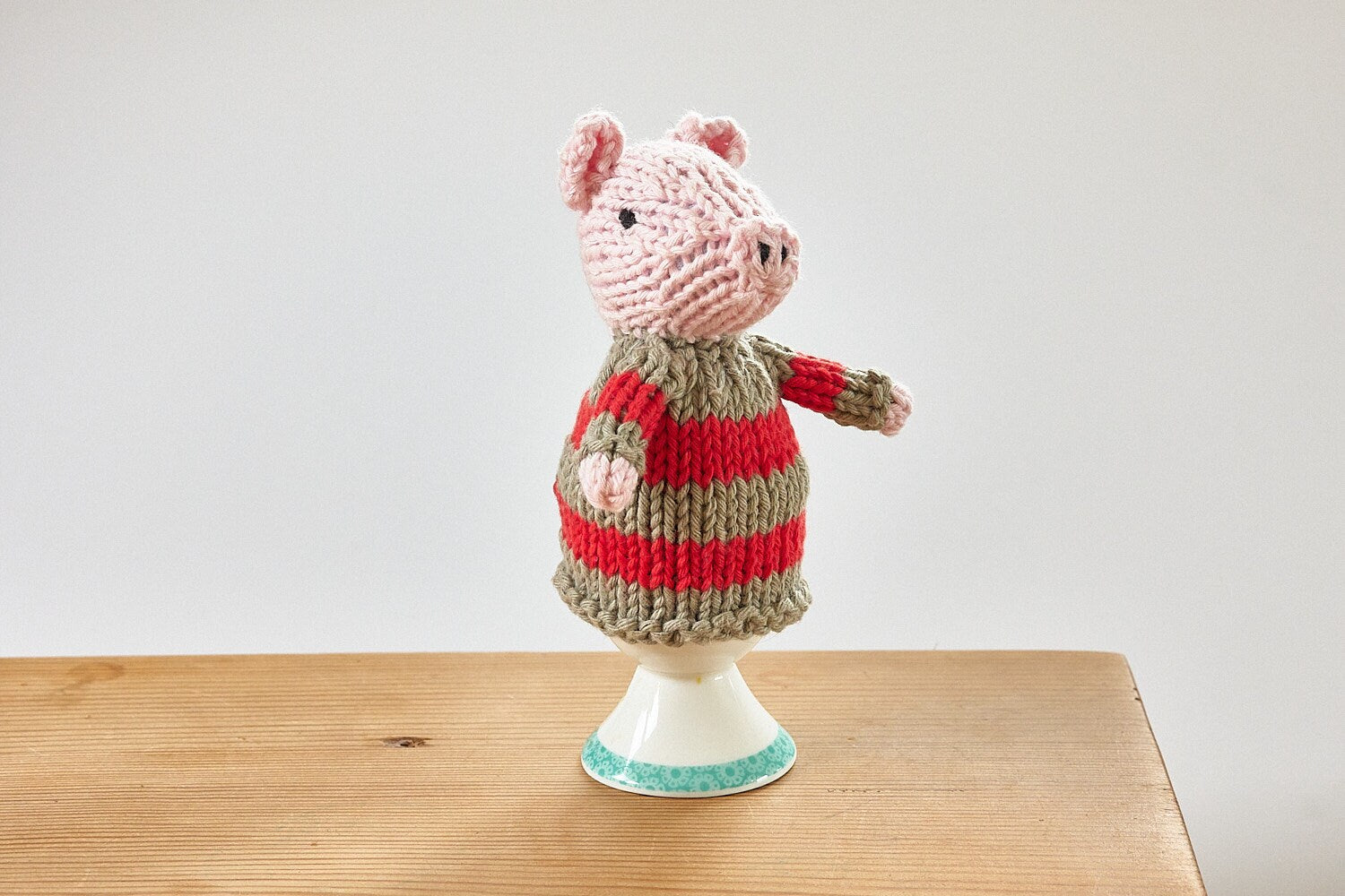 Egg cosy pigs by Rupert's House - hand knitted in washable cotton yarn.
