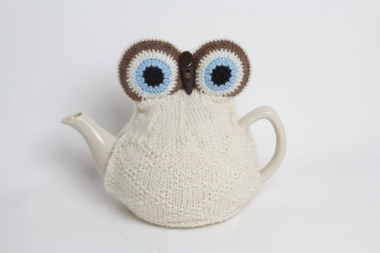 Owl tea cosie hand knitted in supersoft washable yarn with toggle beak and large padded eyes