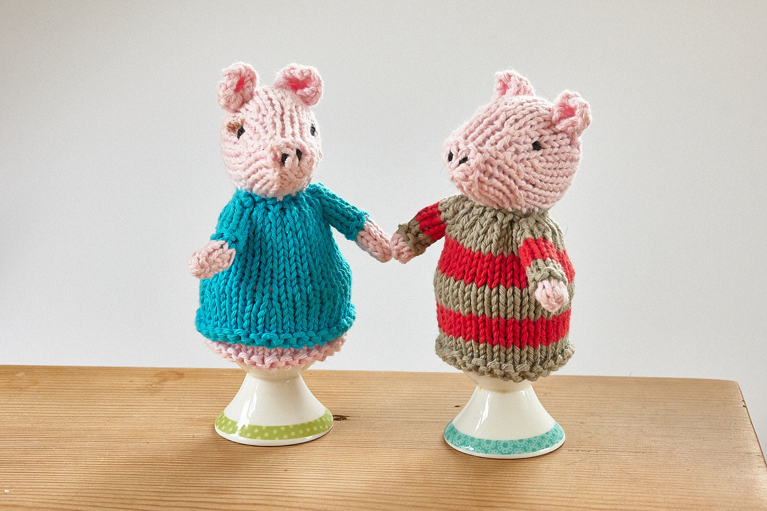 Egg cosy pigs by Rupert's House - hand knitted in washable cotton yarn.