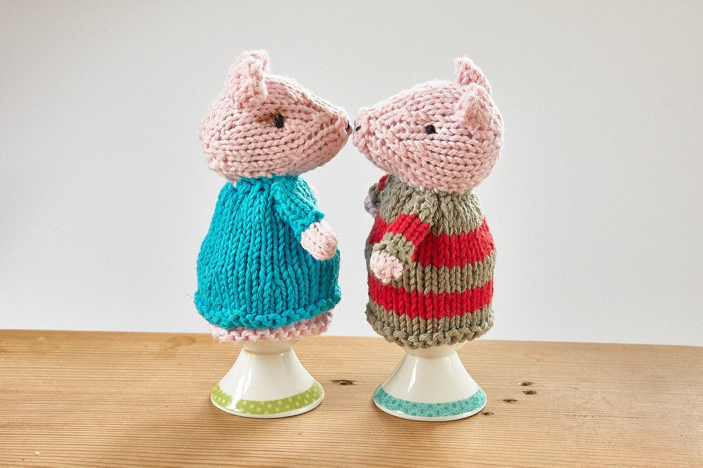 Egg cosy pigs by Rupert's House - hand knitted in washable cotton yarn.