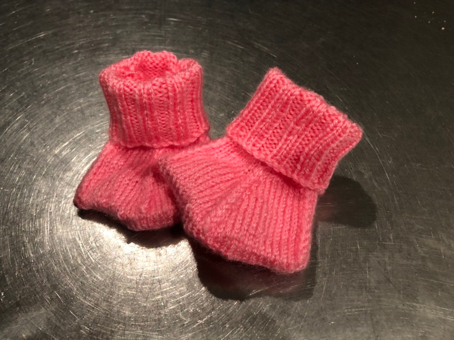 Duck flamingo dinosaur baby boots. Hand knitted washable and can be made in any colour.