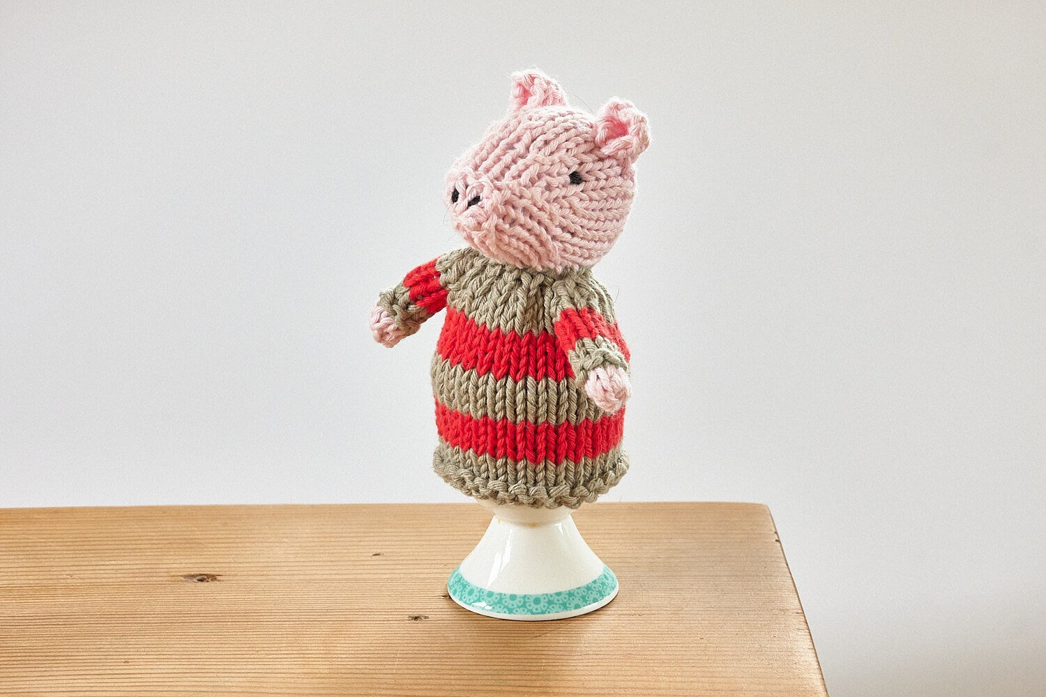 Egg cosy pigs by Rupert's House - hand knitted in washable cotton yarn.