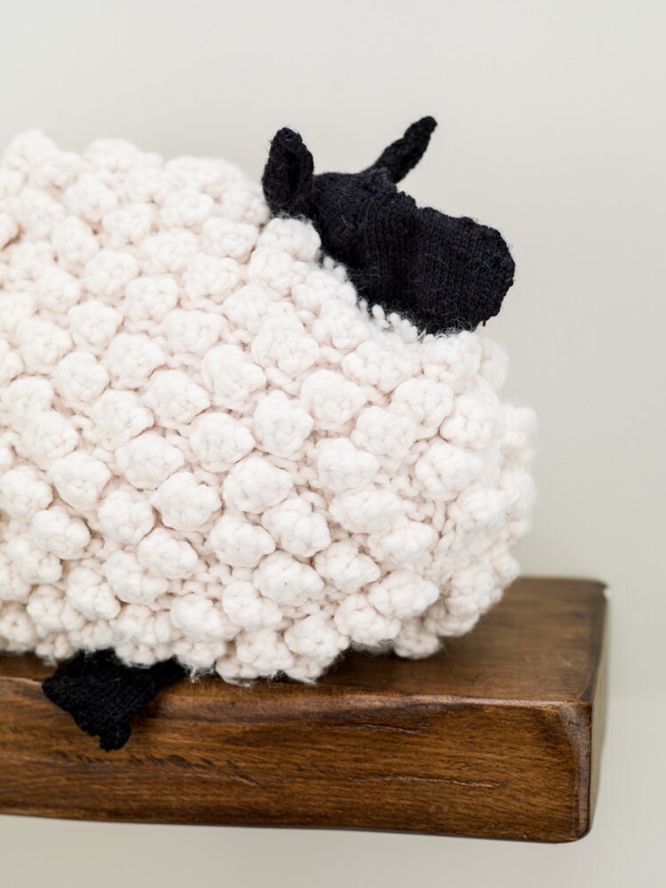 Sheep reversible pillow hand crochet in super chunky cream wool yarn.