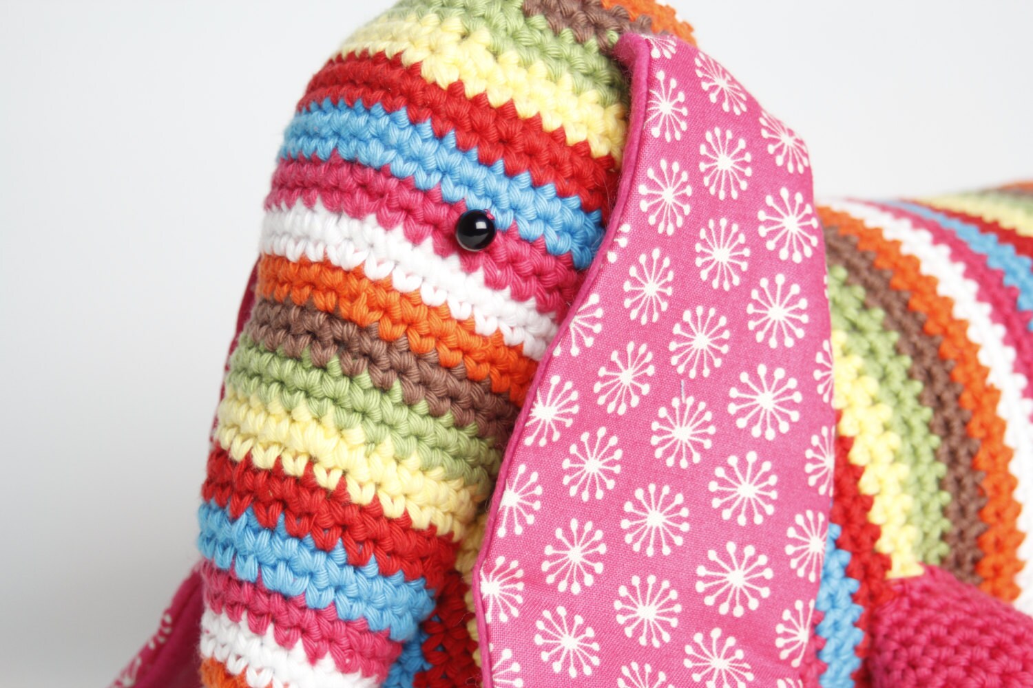 Stripy dachshund sausage dog crochet doorstop or draught excluder.