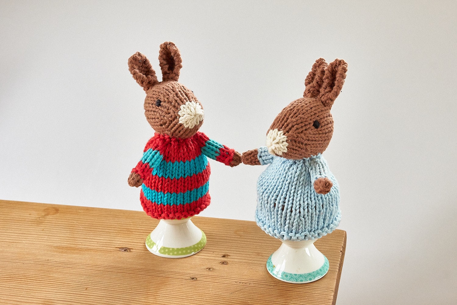 Egg cosy Rabbits by Rupert's House - hand knitted in washable cotton yarn.