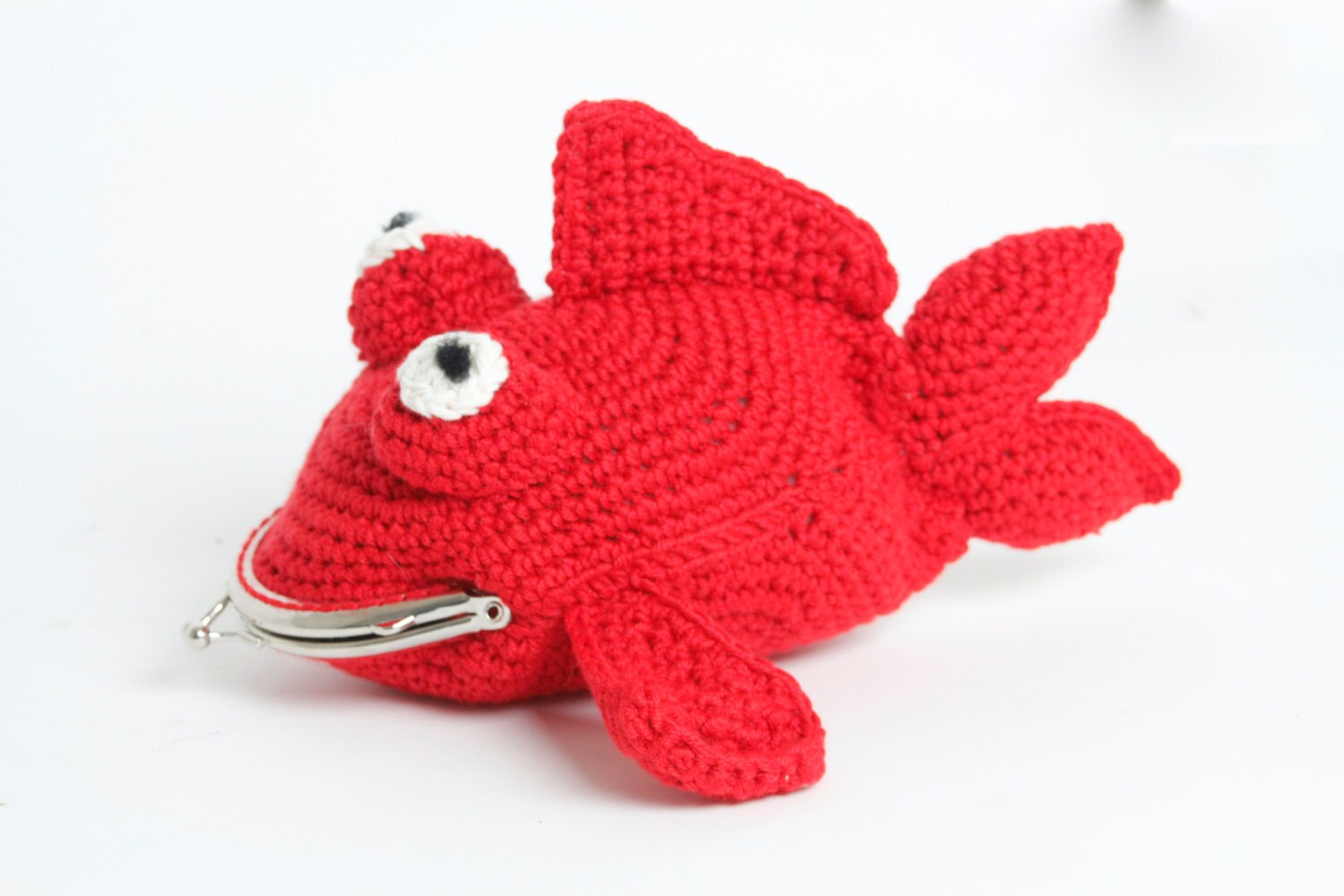 Fish crochet purse with snap clasp fastening. Hand crochet in soft sheen red yarn.