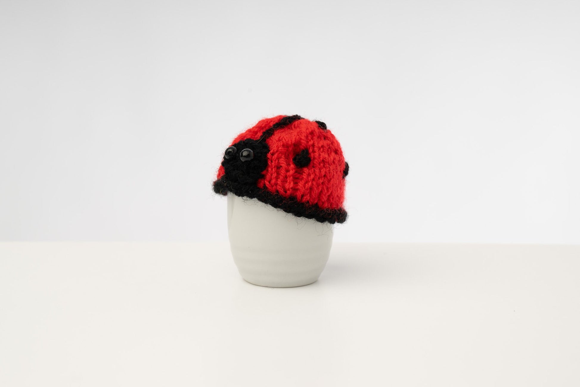 Egg cosie garden set of 4 - Slug Snail Bee and Ladybird hand knitted washable cosies