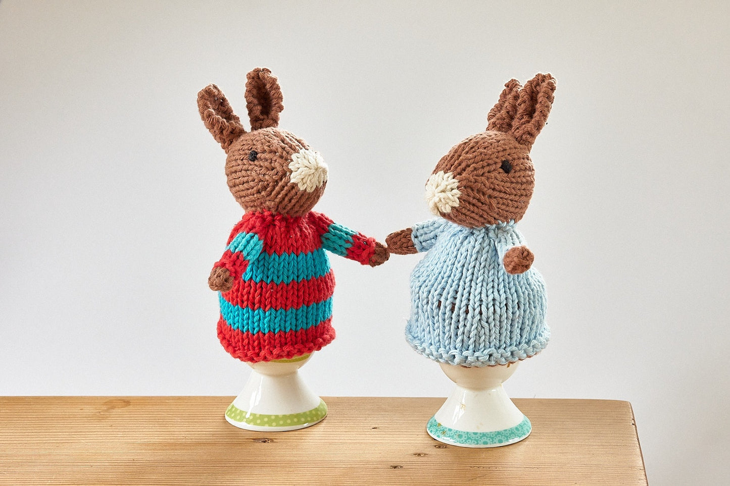 Egg cosy Rabbits by Rupert's House - hand knitted in washable cotton yarn.