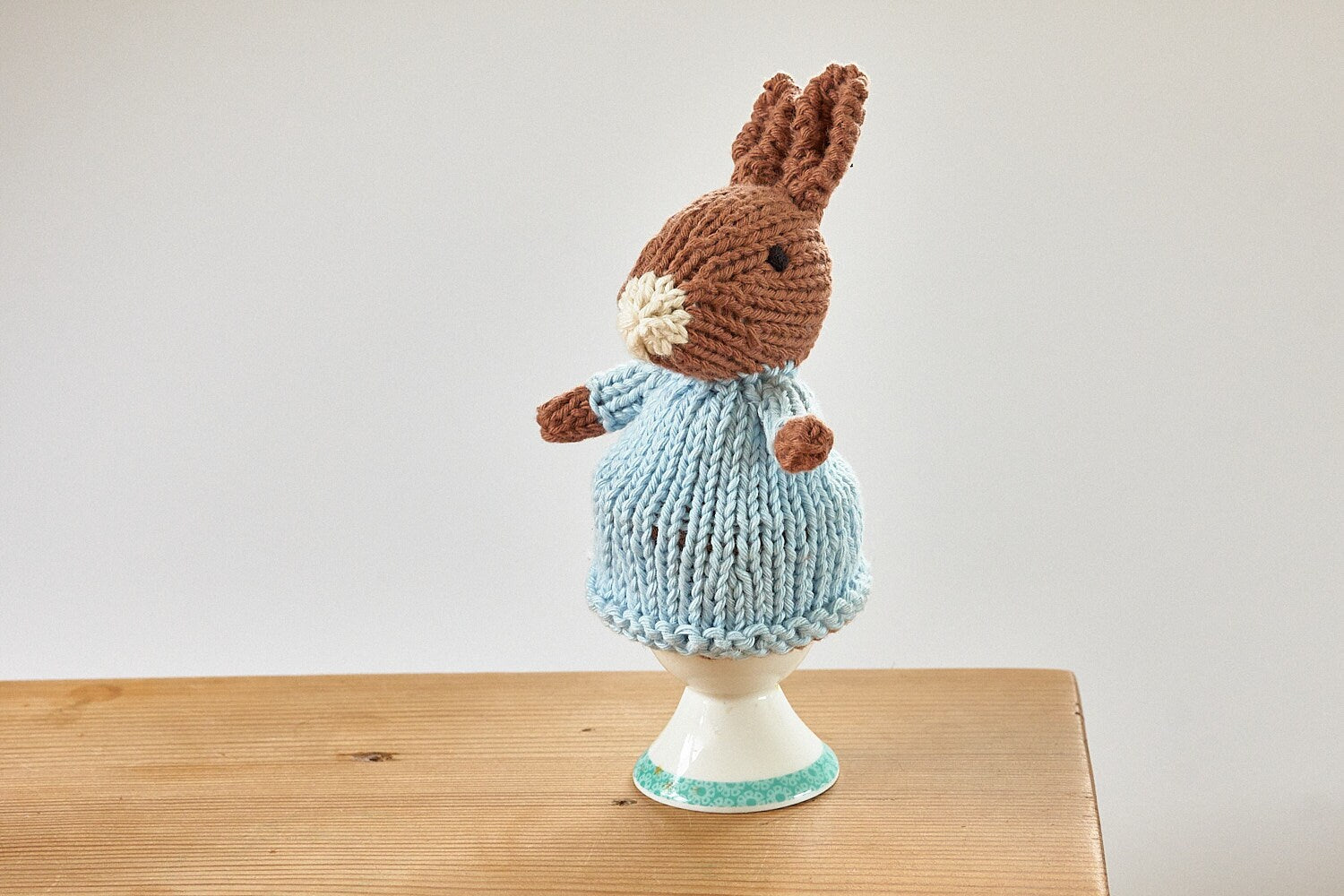 Egg cosy Rabbits by Rupert's House - hand knitted in washable cotton yarn.